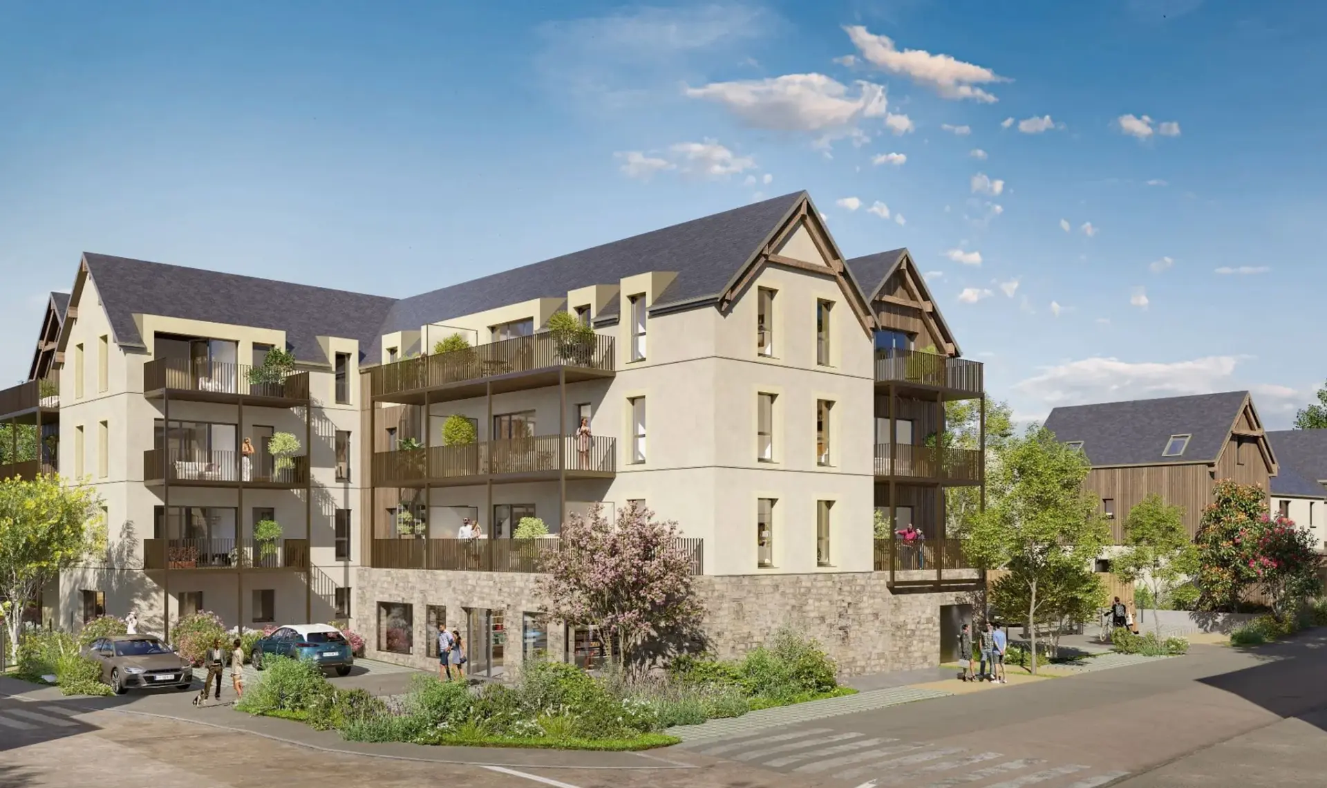 Perspective du programme immobilier neuf Rive Émeraude à La Richardais : façades claires à balcons bois et commerces en pied d'immeuble