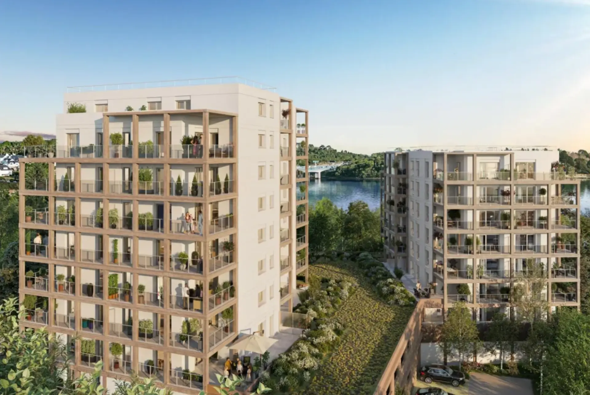 Perspective du programme immobilier neuf O' Scorff à Lorient : bâtiments clairs à loggias bois et végétalisées, au bord du Scorff